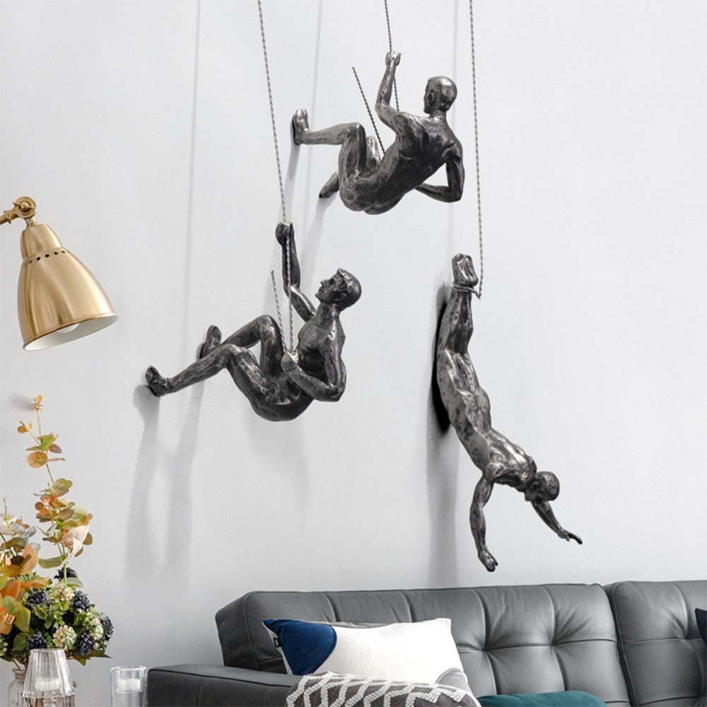 Climber Wall Sculpture, falling climber