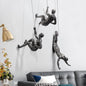 Climber Wall Sculpture, falling climber