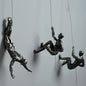 Climber Wall Sculpture, falling climber