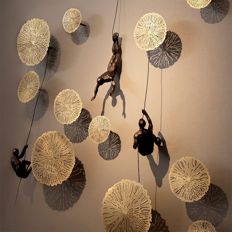 Climber Wall Sculpture, falling climber