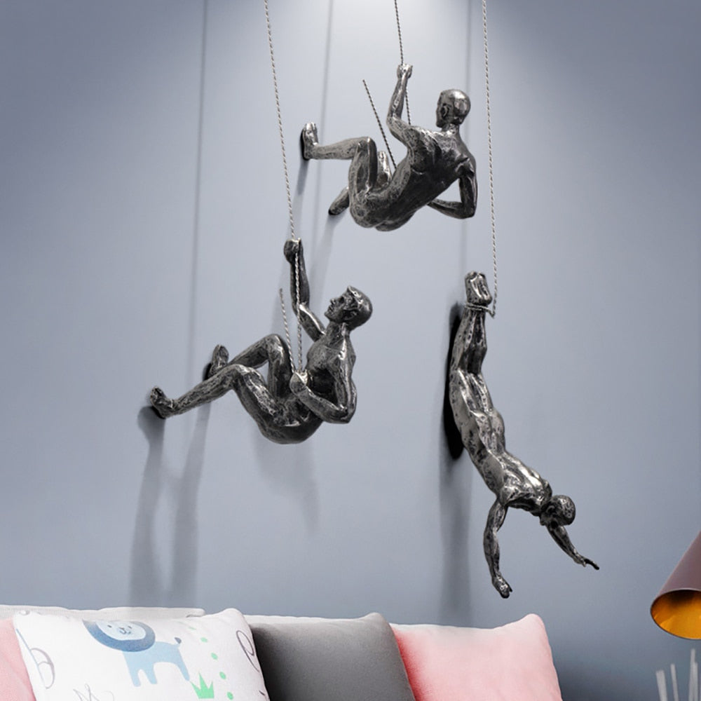Climber Wall Sculpture, falling climber