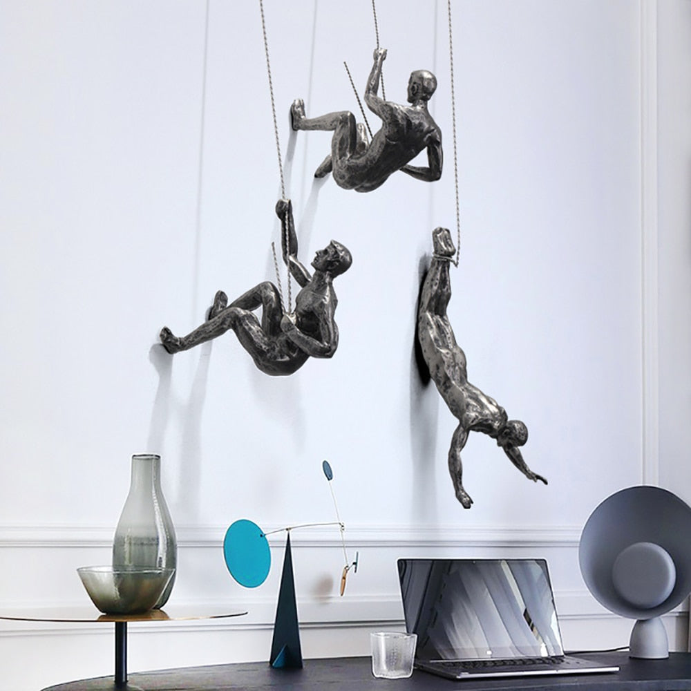 Climber Wall Sculpture, falling climber