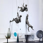 Climber Wall Sculpture, falling climber