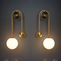 Modern Nordic gold wall sconce with glass globe shade